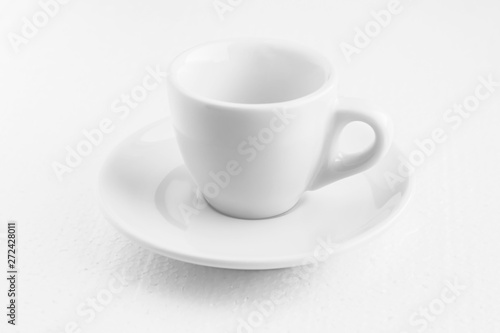 white coffee cup and saucer, empty coffee-free coffee cup, front view from above, or black coffee, on a white background