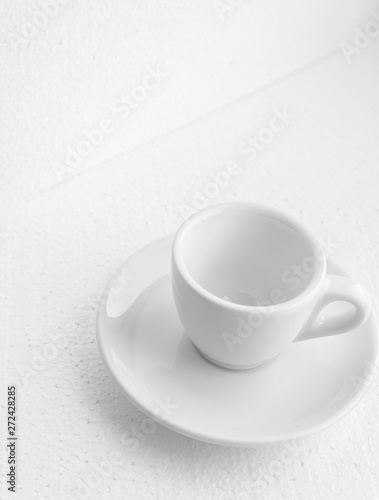 white coffee cup and saucer  empty coffee-free coffee cup  top side view  or black coffee  on a white background