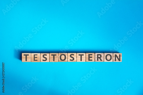 testosteron inscription wooden cubes with letters on a blue background