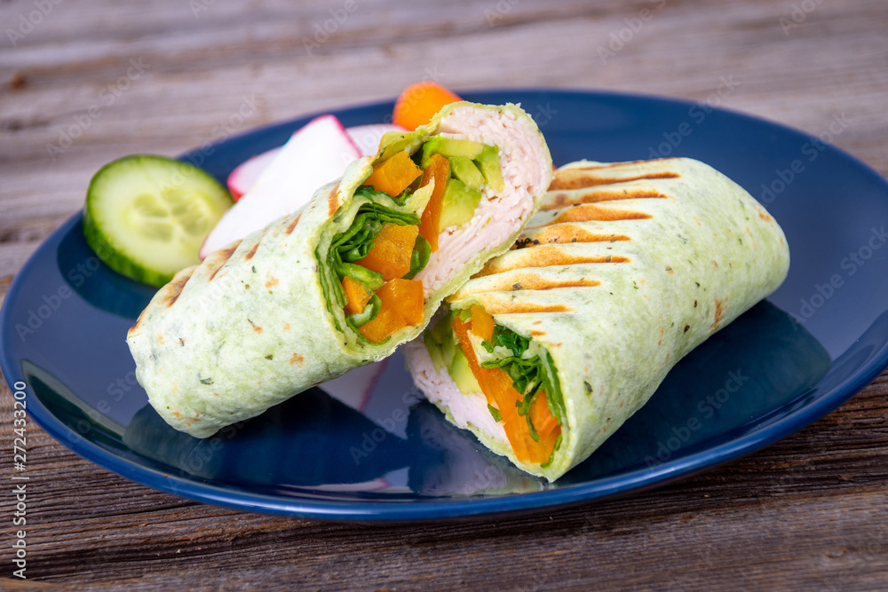 smoked turkey meat in a pesto wrap tortilla sandwiches smoked turkey meat in a pesto wrap tortilla sandwiches
