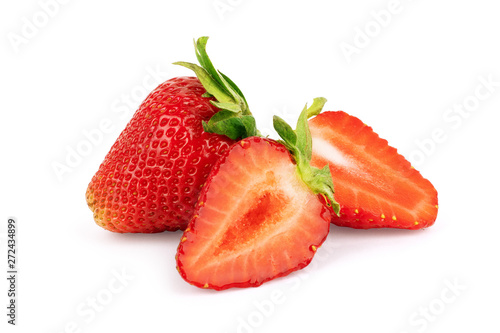 Perfectly retouched strawberry with sliced half and leaves isolated on white background with clipping path.