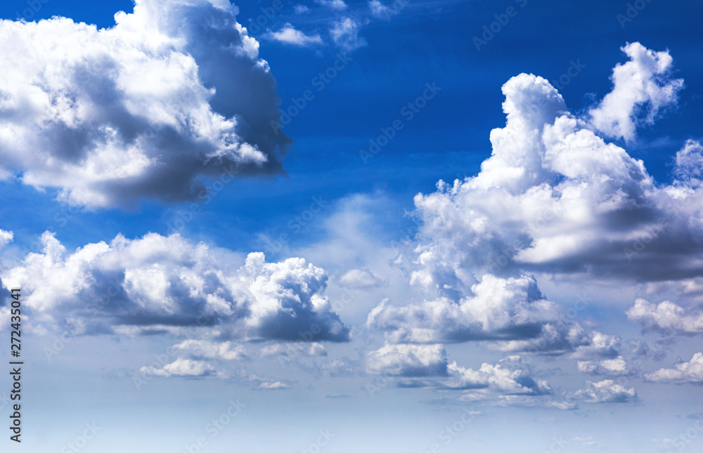 Beautiful blue sky background with sparced white cumulus clouds Beautiful blue sky background with sparced white cumulus clouds