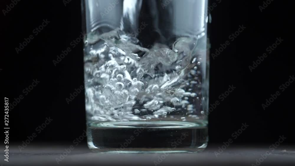 Close up pouring purified fresh drink water Close up pouring purified fresh drink water