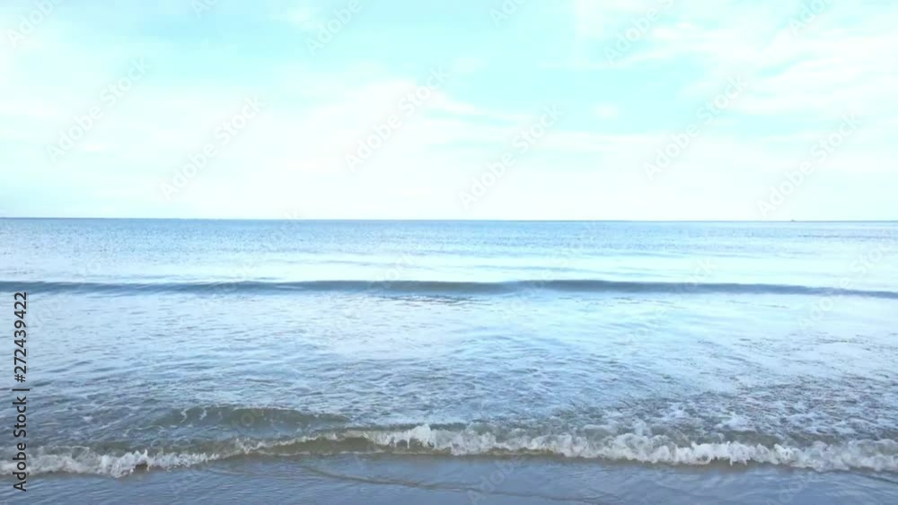 The sea that is blowing a lot of water waves toward the land. The sea that is blowing a lot of water waves toward the land.