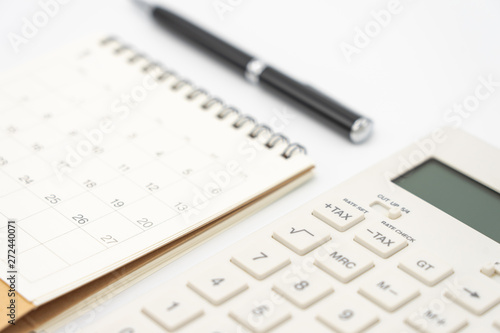 Wallpaper Mural Flat lay of top view office table desk with Calendar, calculators pens and other office supplies as background Workspace and Comfortable work table concept with copy space. Torontodigital.ca