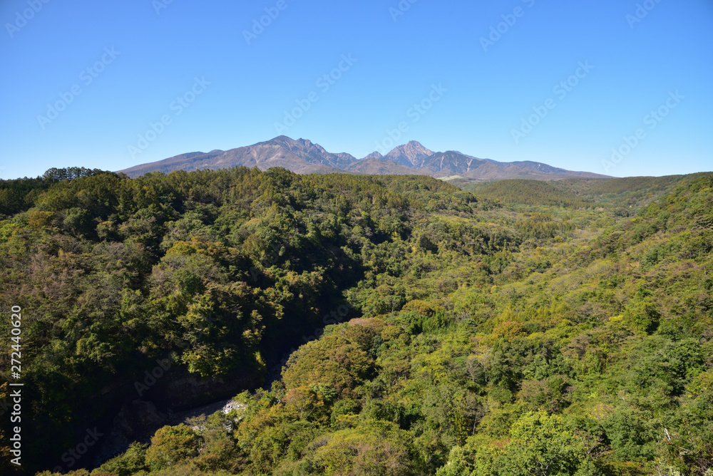 Mountains with red leaves and blue sky