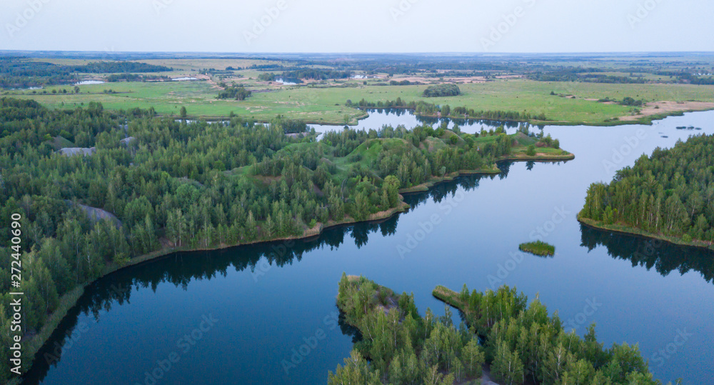 Blue lake. Fields and forest. The view from the heights. Tula.