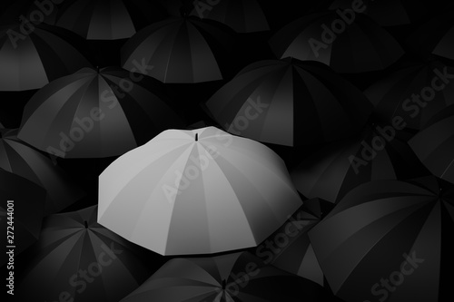 White umbrella in the midst of black. Difference concepts. 3D rendering.