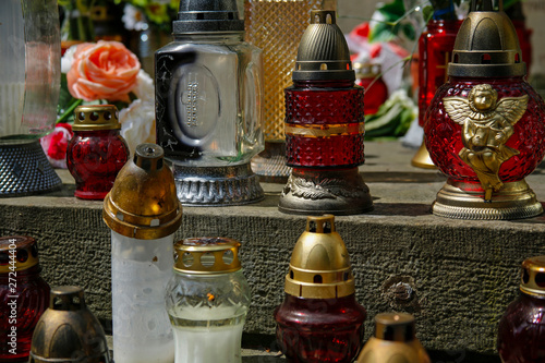 closeup of colorful grave memory candles