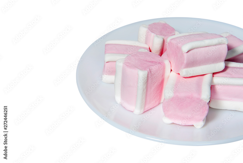 Sweet candies on a white porcelain plate Sweet candies on a white porcelain plate