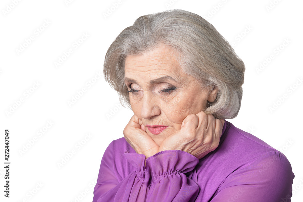Portrait of thoughtful senior woman on white background Portrait of thoughtful senior woman on white background