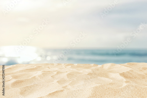Canvas Print Empty sand beach in front of summer sea background with copy space