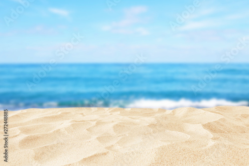 Fototapeta Naklejka Na Ścianę i Meble -  Empty sand beach in front of summer sea background with copy space