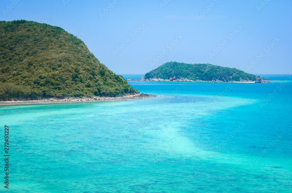 Fototapeta premium beautiful beach on the island like paradise and clear blue aqua sea water on summer background vacation in Thailand.