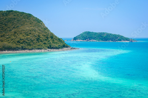 beautiful beach on the island like paradise and clear blue aqua sea water on summer background vacation in Thailand.