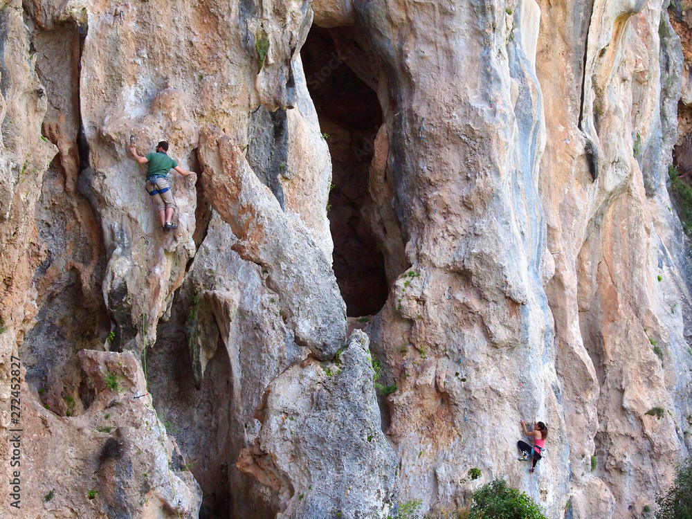 Rock climbing man and girl in Turkey, Geyikbayiri Route Trebenna,