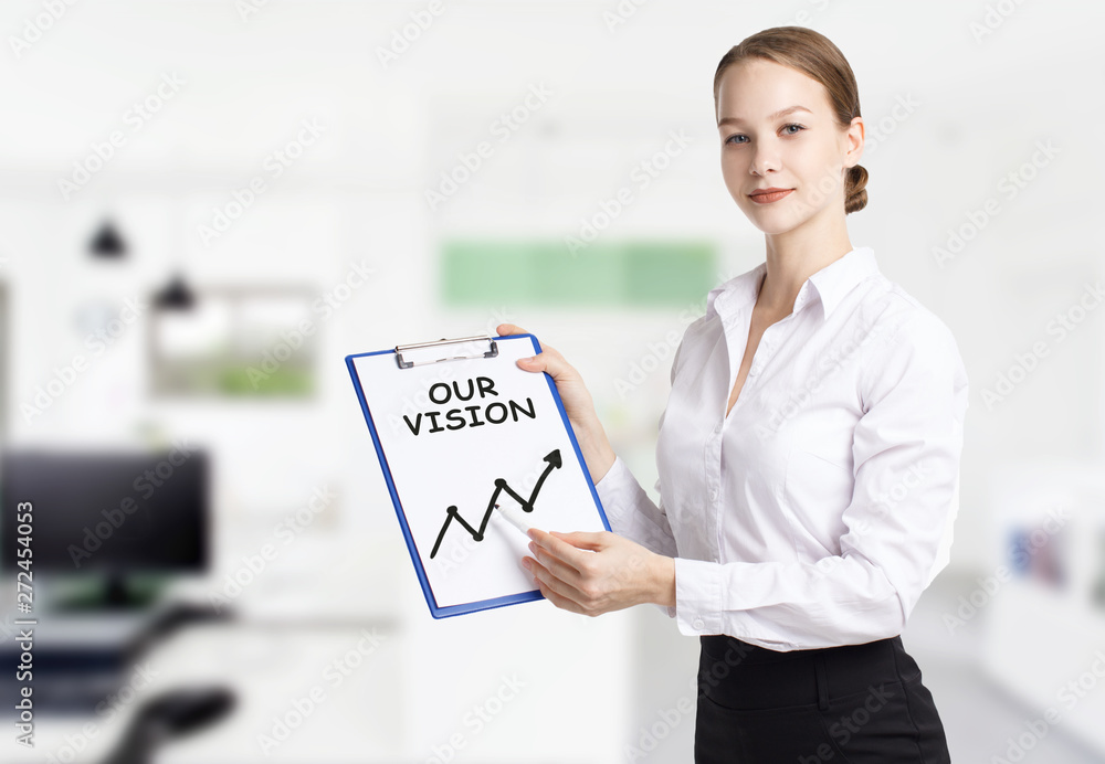 Business, technology, internet and networking concept. Young entrepreneur showing keyword: Our vision Business, technology, internet and networking concept. Young entrepreneur showing keyword: Our vision