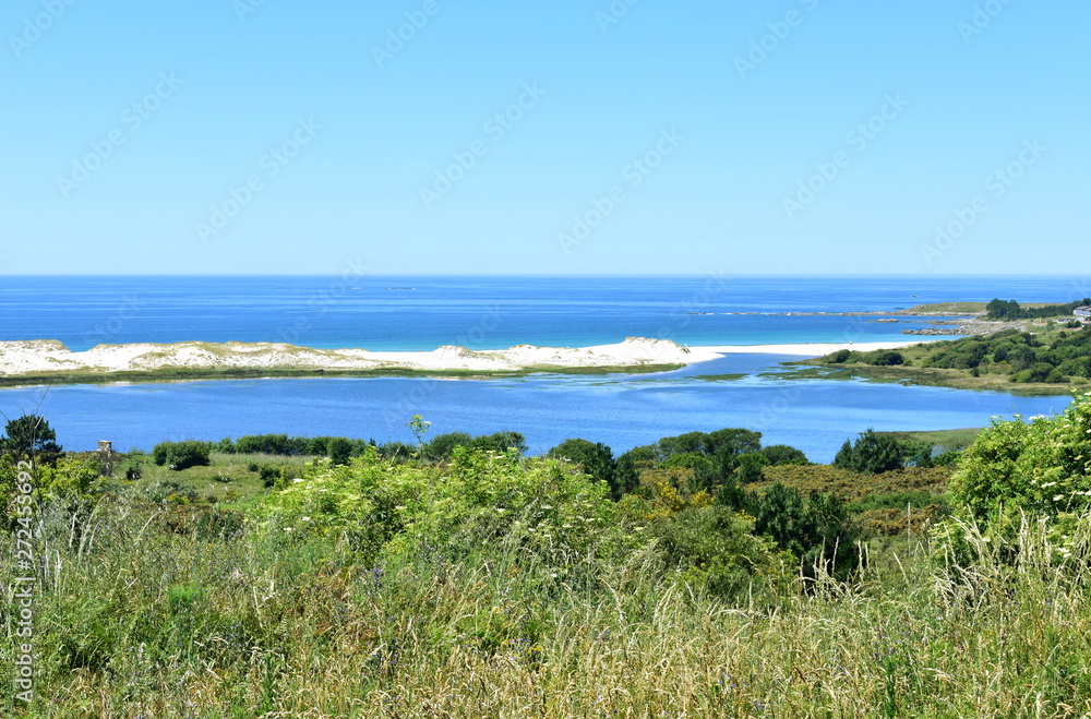 Beach with lake and big sand dunes. Galicia, Spain.