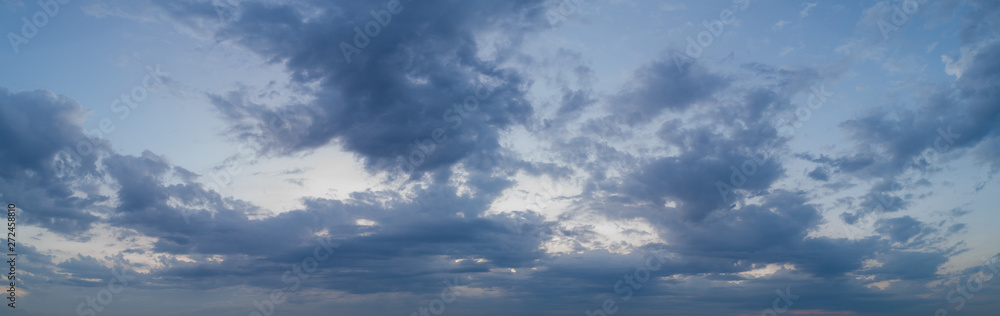 Panorama of blue sky with light clouds