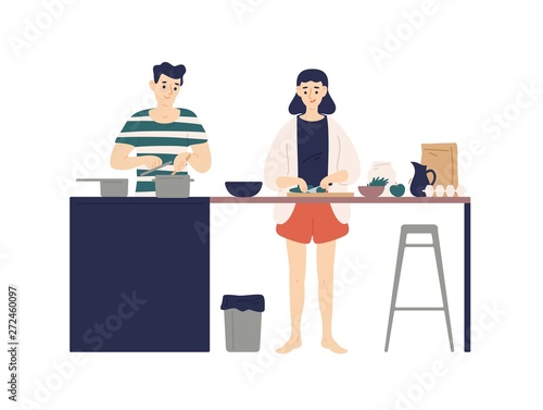 Cute young man and woman cooking meals in kitchen. Smiling boy and girl making lunch or dinner together at home. Daily life of happy romantic couple. Flat cartoon colorful vector illustration.