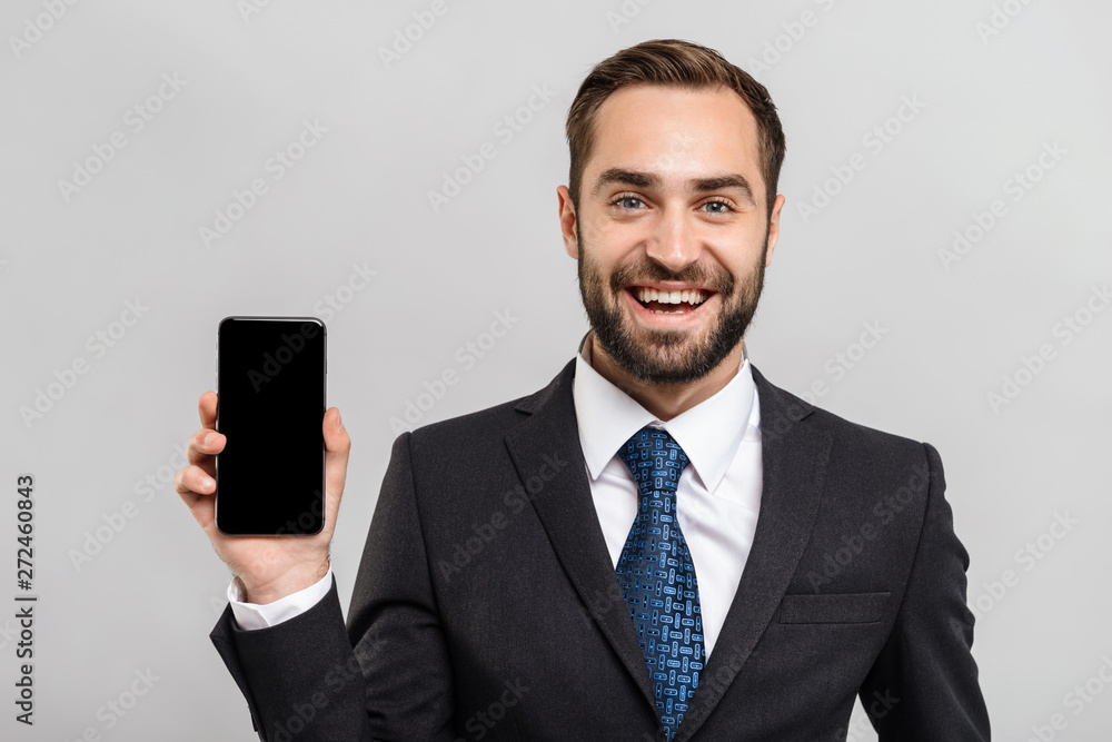 Handsome confident businessman wearing suit standing Handsome confident businessman wearing suit standing