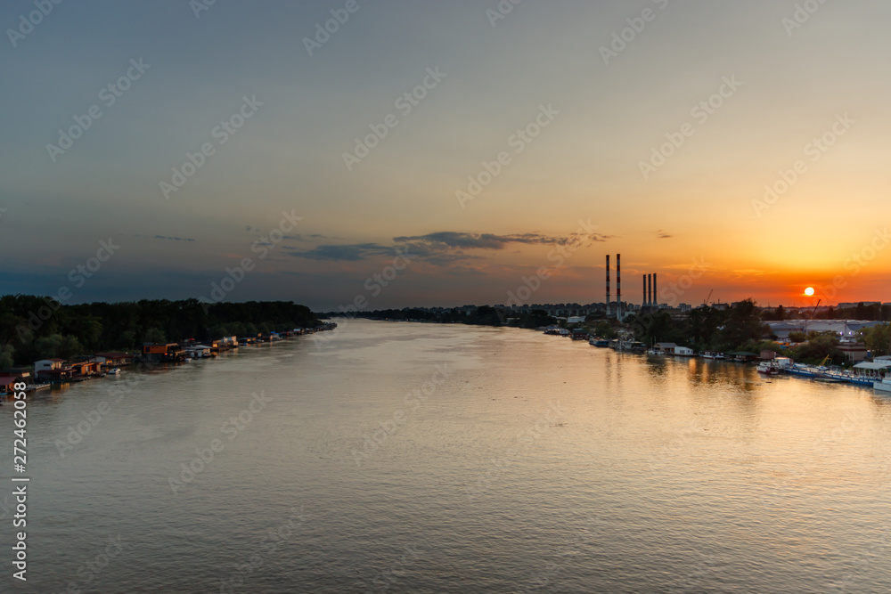 Sunset at Sava river, sunset in industrial aerea of Belgrade