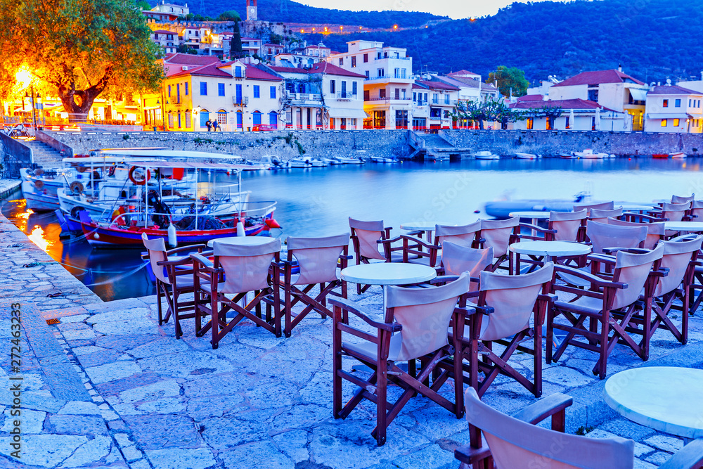 Greece, Europe - scenic twilight scenery of street cafe in ancient Greek harbor Nafpaktos. Nafpaktos was important part of ancient Greece.  Nowdays Nafpaktos is popular travel destination in Greece.