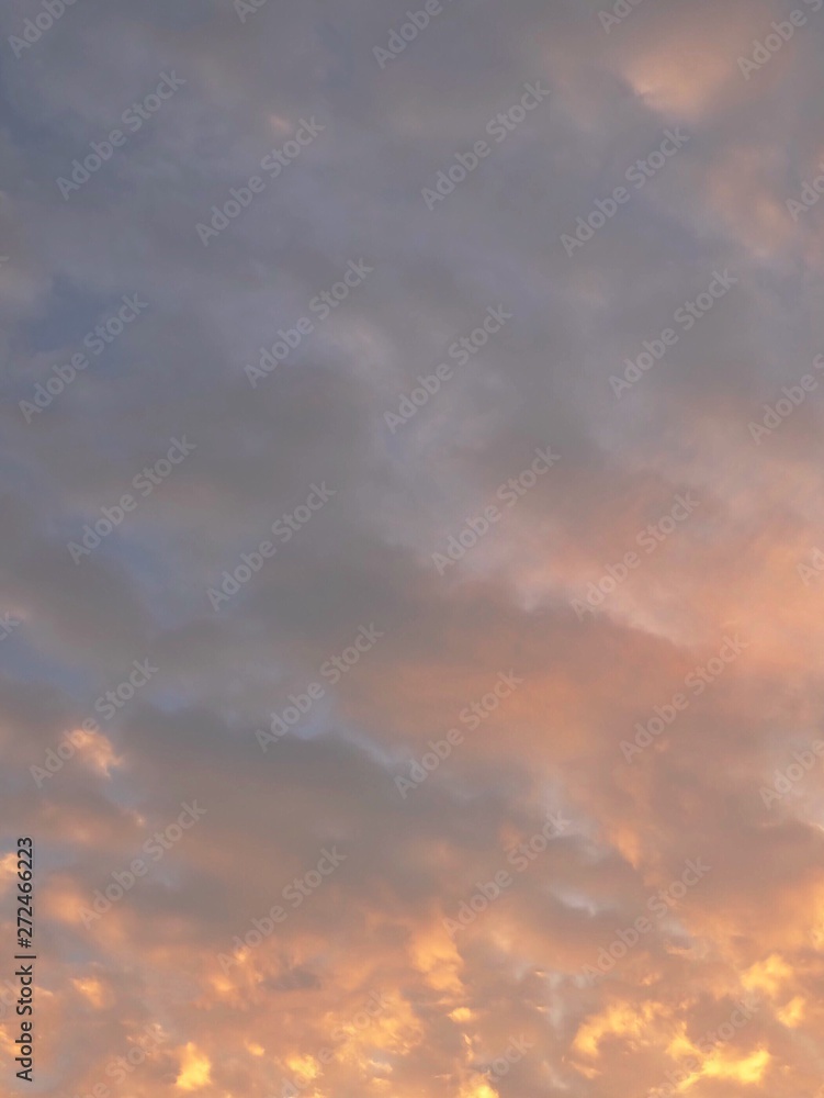Golden Sunrise Sky with Tiny White Clouds