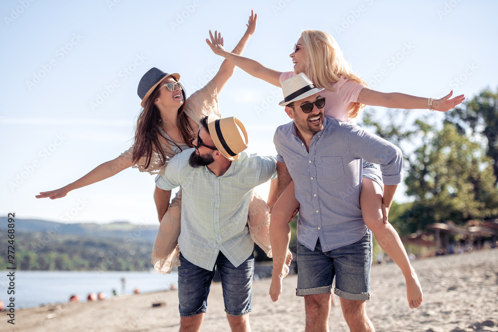 Group of happy young people on the beach Group of happy young people on the beach
