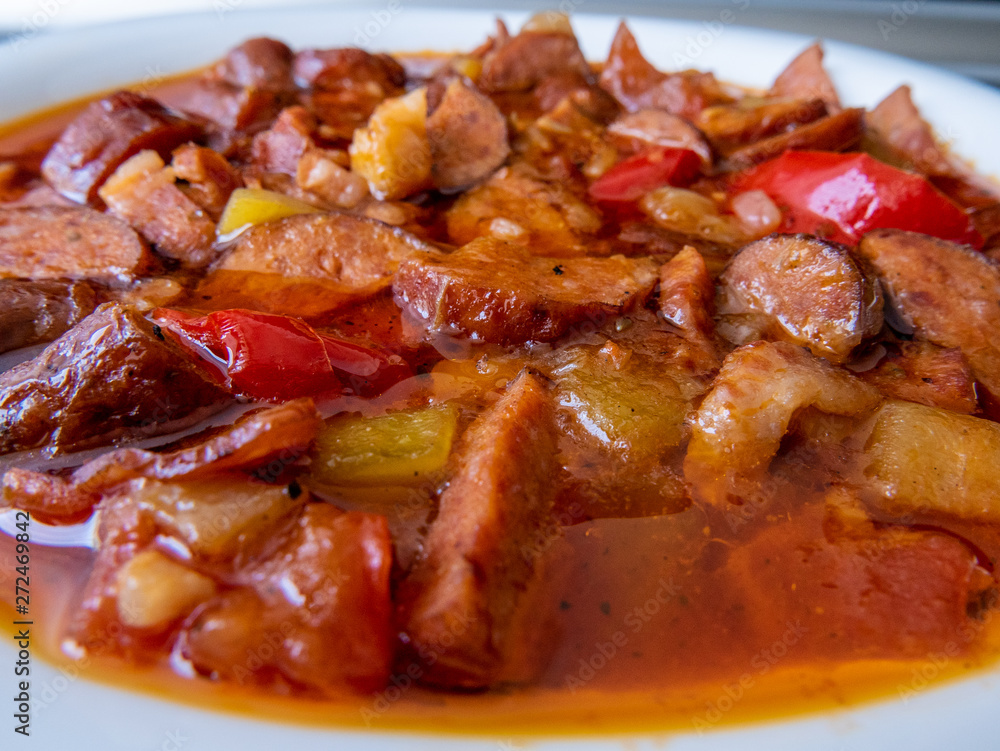 Ketogenic meal, fat Letcho with sausage, bacon, pepper and tomato Ketogenic meal, fat Letcho with sausage, bacon, pepper and tomato