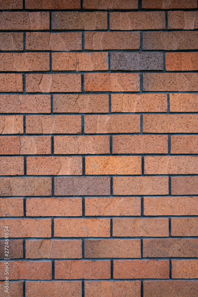 Obraz premium Horizontal brown brick wall.