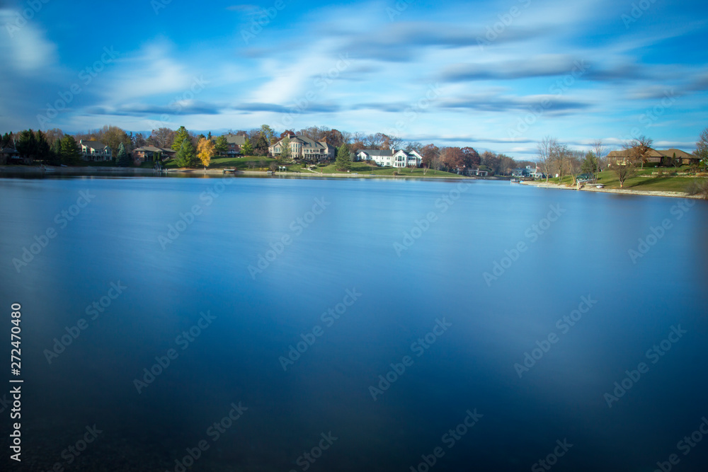 panorama of lake with blue sky and clouds