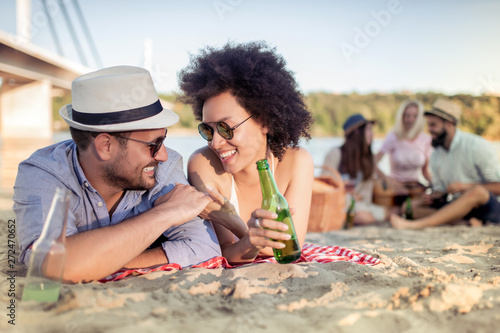 Couple having fun together on the beach