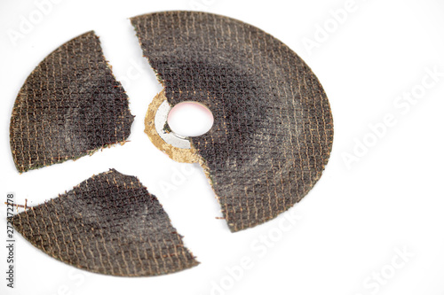 dangerous broken cracked cutting wheels abrasive safety work disc isolated white background photo close up