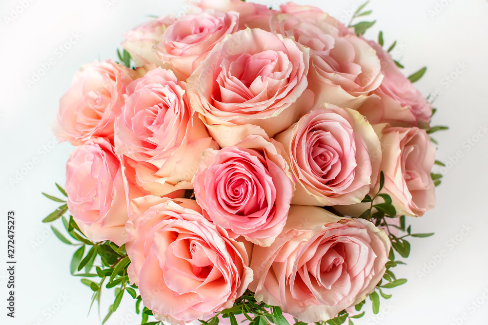 Beautiful Wedding bouquet of pink roses close up. The concept of marriage and love. Beautiful Wedding bouquet of pink roses close up. The concept of marriage and love.