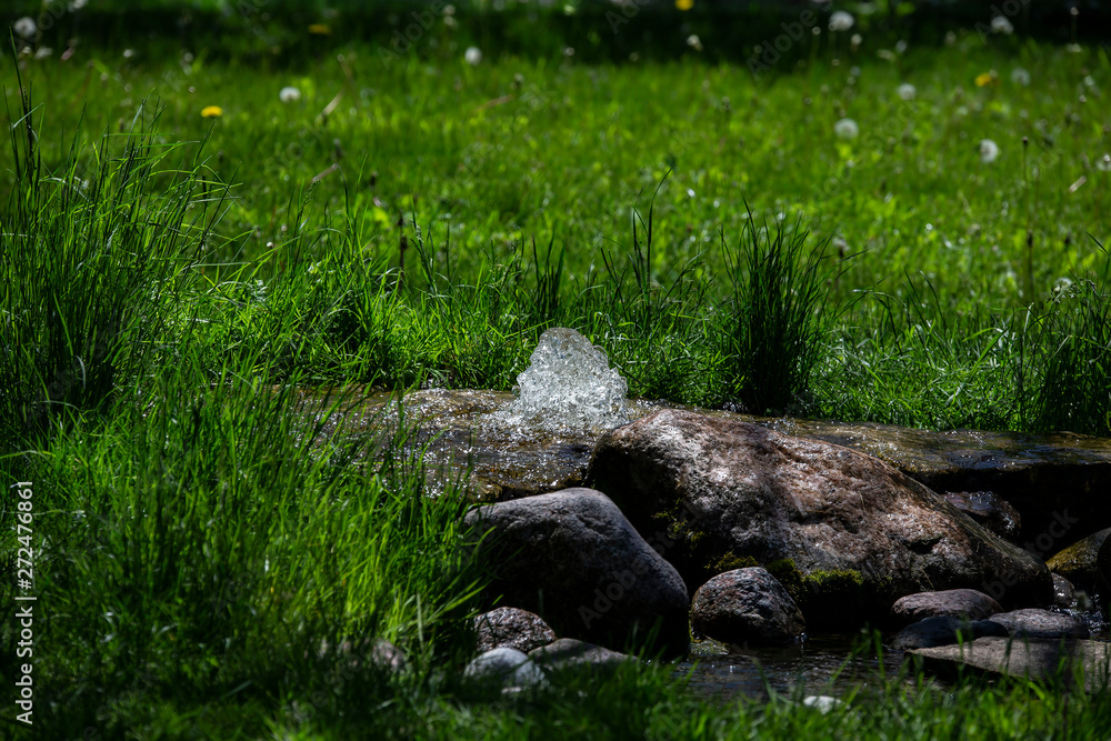 flowing spring of pure, spring water flowing spring of pure, spring water