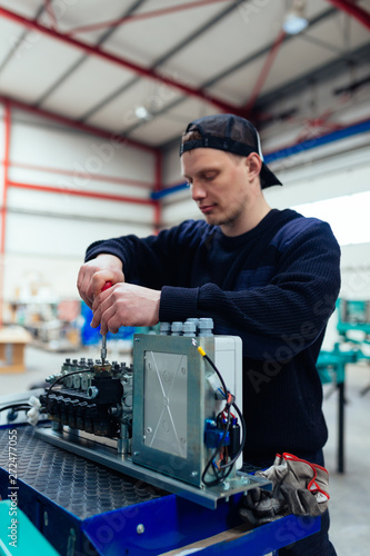 Reparing an engine in the factory.