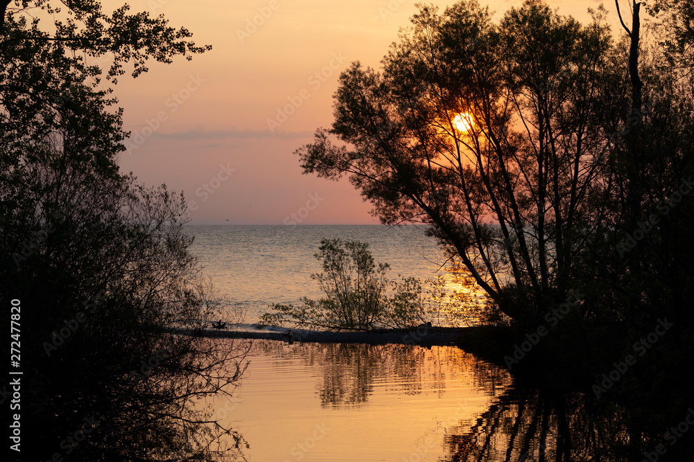 Sunrise over Lake Michigan,nature scene from Wisconsin,mouth of the river Sunrise over Lake Michigan,nature scene from Wisconsin,mouth of the river