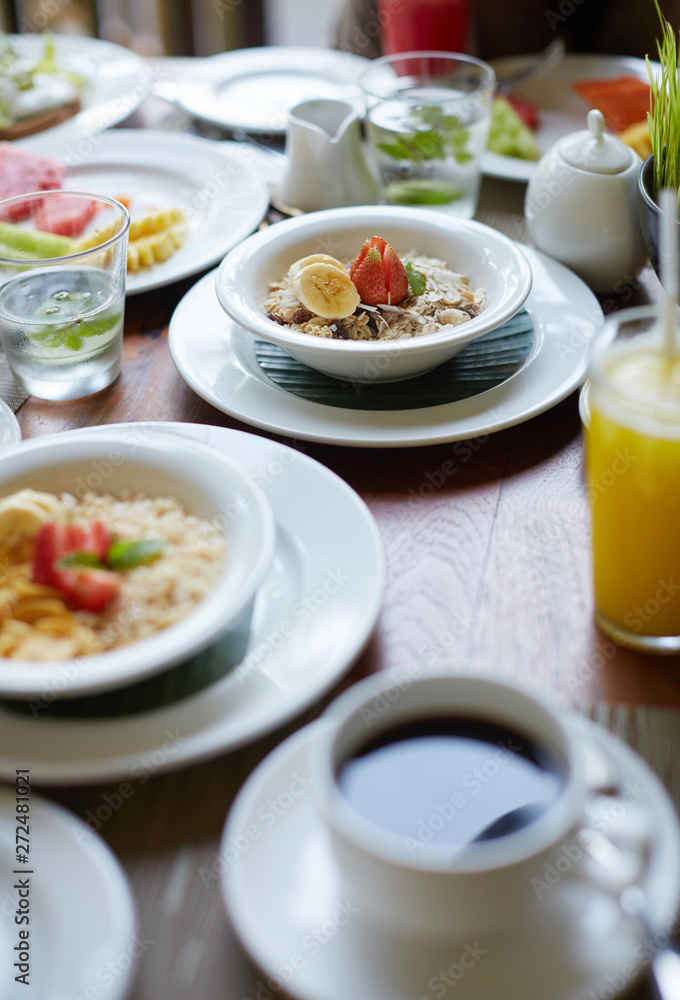 Rich and healthy breakfast on the table, on a sunny morning Rich and healthy breakfast on the table, on a sunny morning