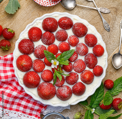 Strawberry mascarpone tart  no bake Tart with mascarpone cream and fresh strawberries  top view. Homemade  summer  simple dessert