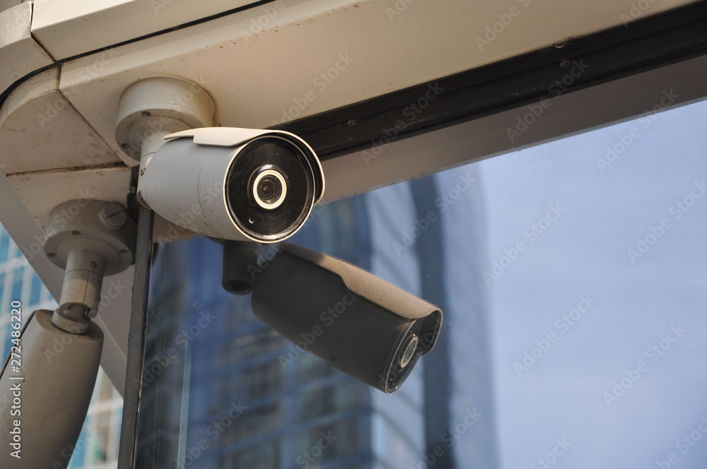 closed circuit camera Multi-angle CCTV system against the blue sky. closed circuit camera Multi-angle CCTV system against the blue sky.