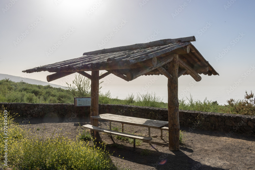 wooden canopy with table and benches on observation deck wooden canopy with table and benches on observation deck