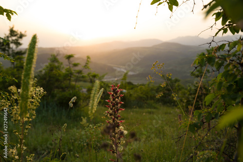 Beautiful landscape in the mountains with the sun at dawn. Mountains at the sunset time. Azerbaijan Caucasus Mountains. Agsu pass. Baskal. Nature