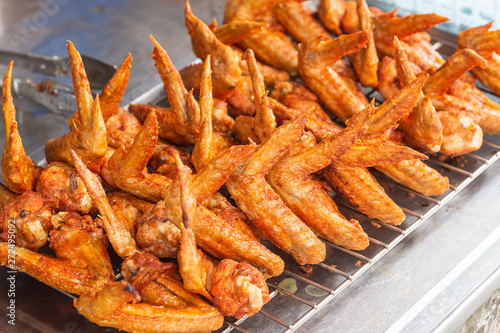 closeup photo of fried chicken wings on the table