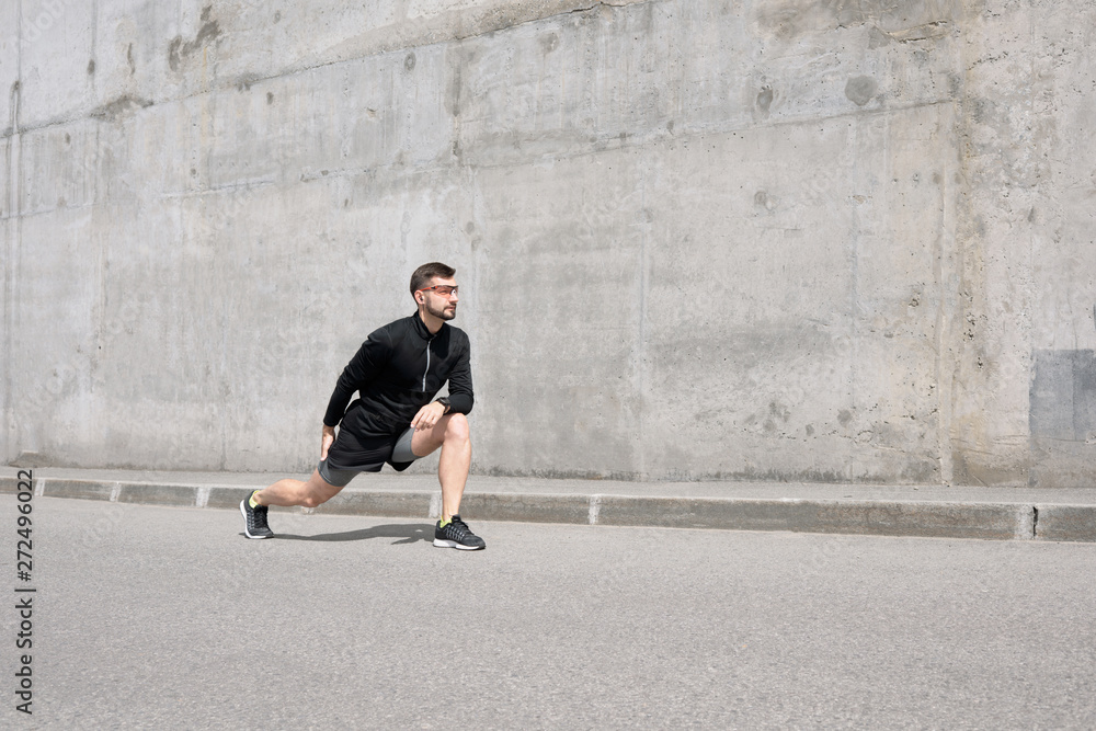 Athlete Training In Urban Background Athlete Training In Urban Background