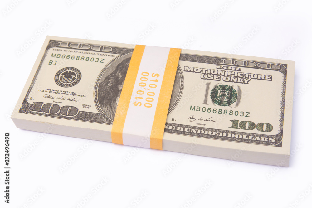 100 US Dollar bills bundles stack isolated on white background with clipping path 100 US Dollar bills bundles stack isolated on white background with clipping path