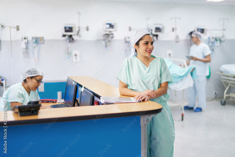 Confident female doctor in the intensive care unit Confident female doctor in the intensive care unit