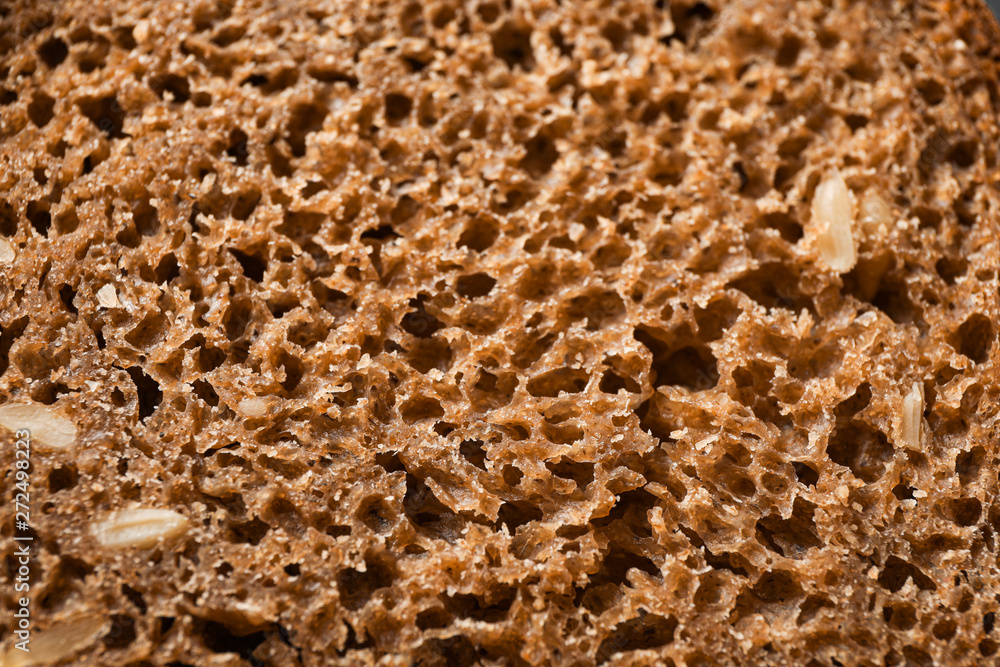 Rye bread as background, closeup and space for text Rye bread as background, closeup and space for text