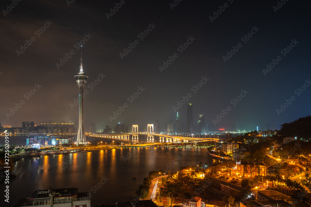 Night view of the Macau Tower and skyline of Macau, China