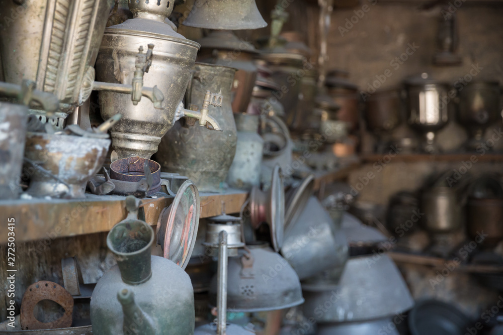 Coppersmith workshop and hand made copper things, Lahich, Azerbaijan. Interior of coppersmith workshop in the village. Coppersmith workshop and hand made copper things, Lahich, Azerbaijan. Interior of coppersmith workshop in the village.